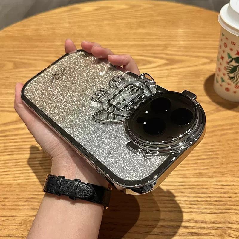 Glitter Astronaut Camera Stand Phone Case For I14 13 12 11 Pro Max XR 14 Plus Invisible Lens Bracket Plating Soft Cover.